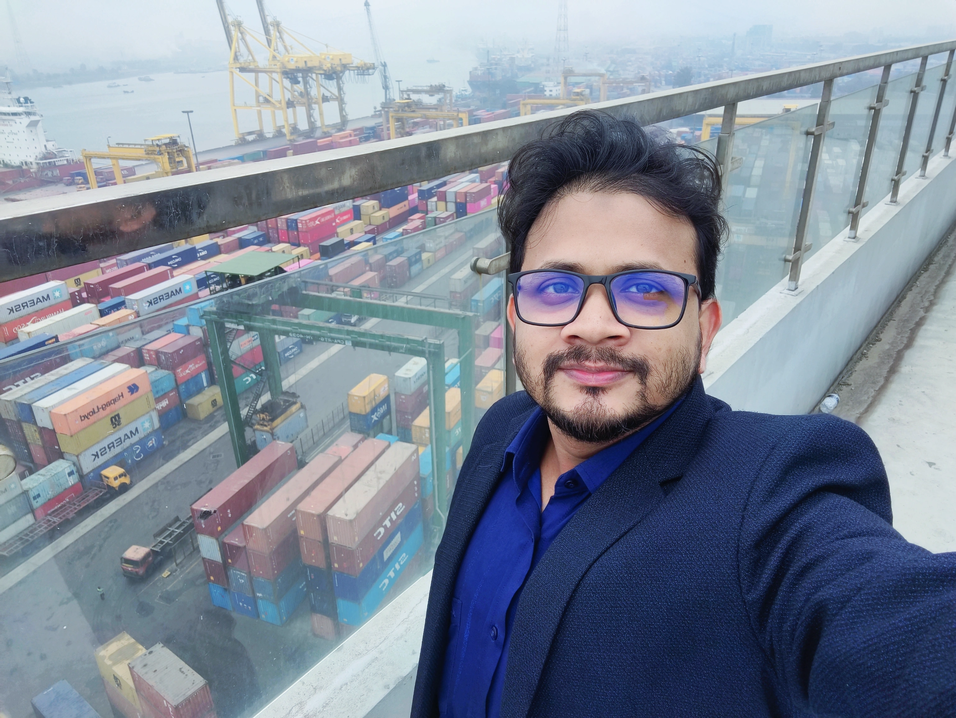 On a quay crane overlooking the container terminal