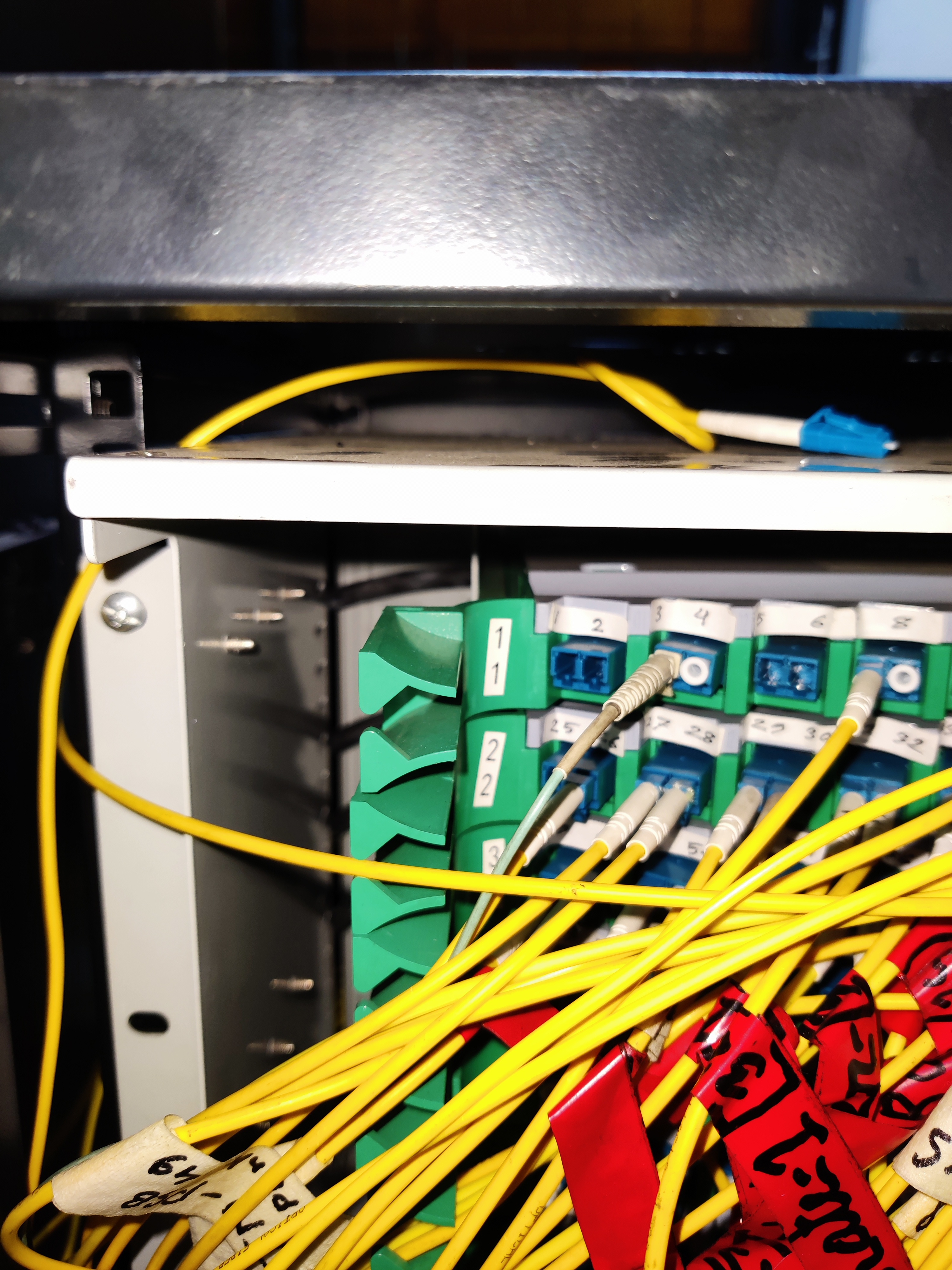 Working on a fiber optic distribution frame