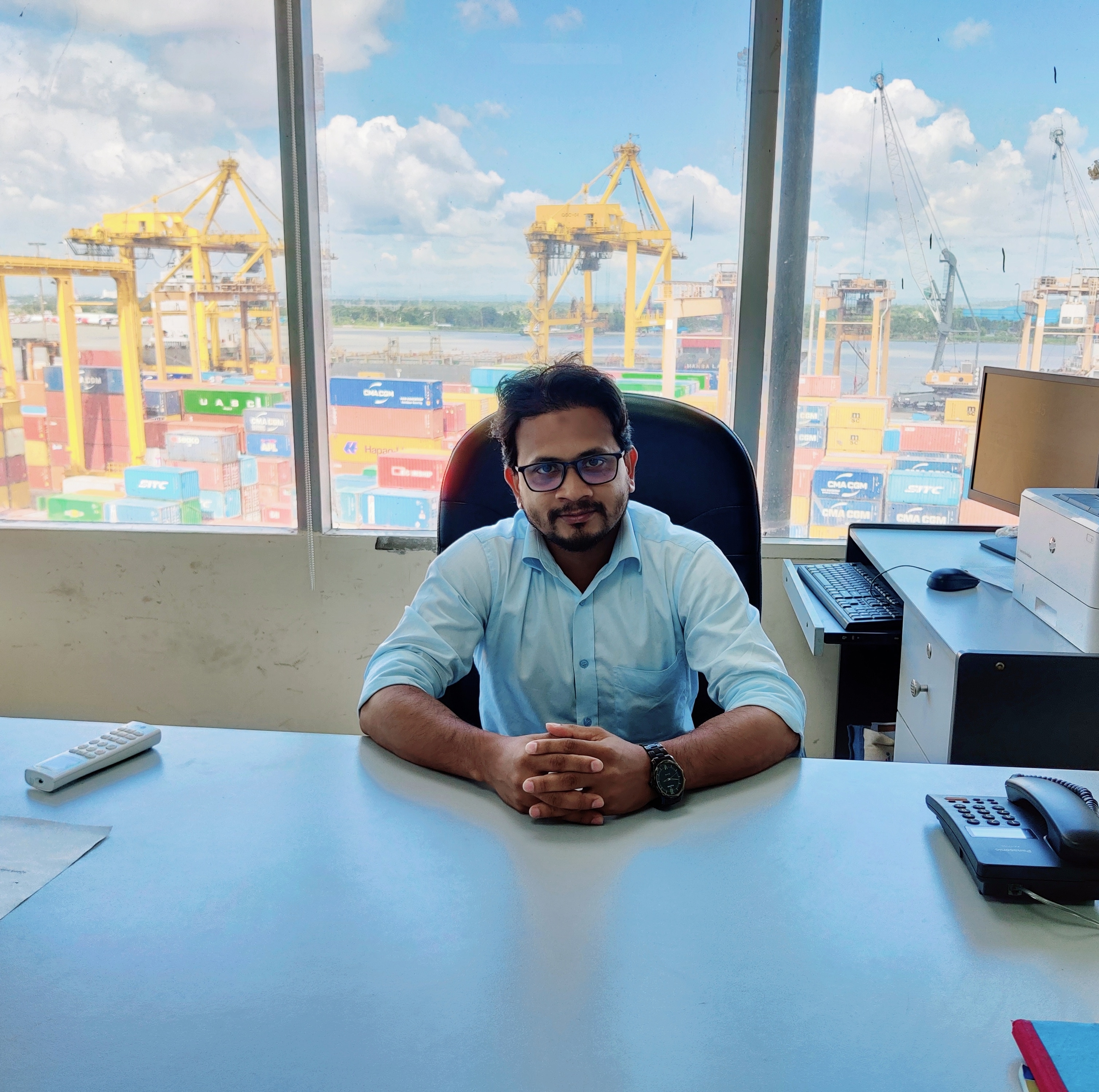 At the office desk at Chittagong Port Authority overlooking the container yard